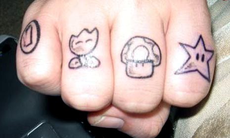 shit tattoos. Nintendo Knuckle Tattoos