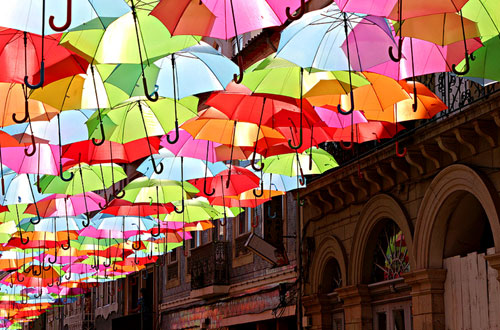 Umbrella Lined Street In Agueda Portugal