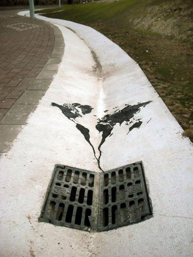Painted World Map Heading Down The Drain