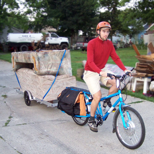 Yuba Modo Bicycle Trailer Hauling Two Sofas