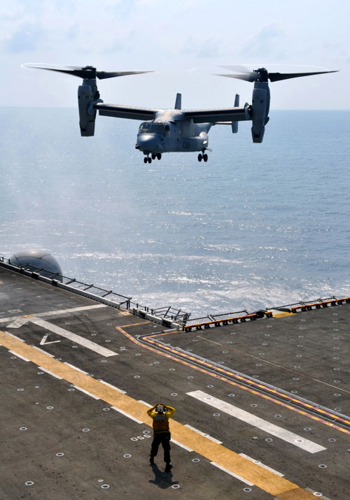 MV-22 Osprey Helicopter Approaching An Aircraft Carrier