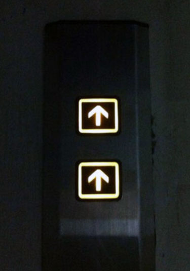 Two Elevator Up Buttons