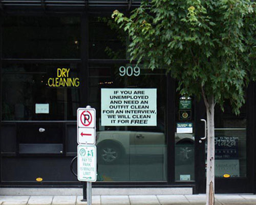 Dry Cleaners Offering Complimentary Service To Unemployed Preparing For An Interview