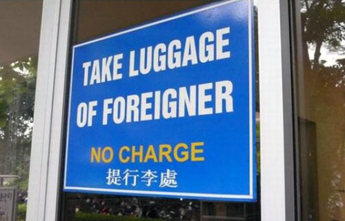 Take Luggage of Foreigners Sign