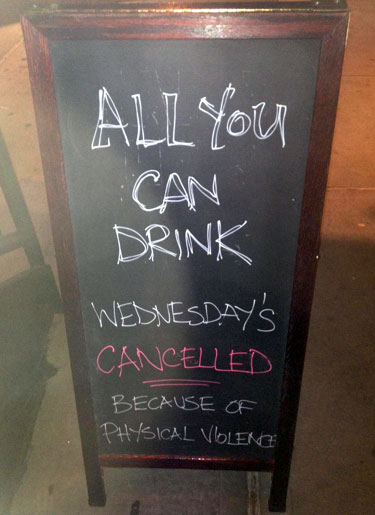 Sign Announcing All You Can Drink Cancelled
