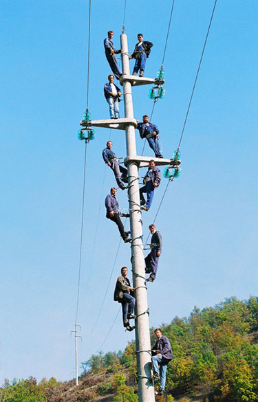 Electricians Staff Photo On A Pole